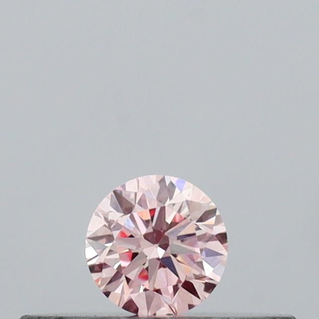 Actual 0.11 carat Intense Pink Round lab-grown diamond