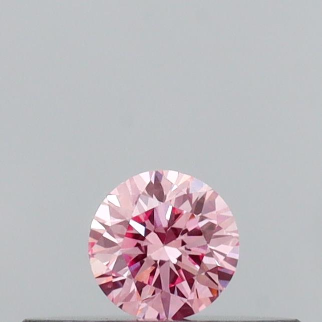 Actual 0.13 carat Vivid Pink Round lab-grown diamond