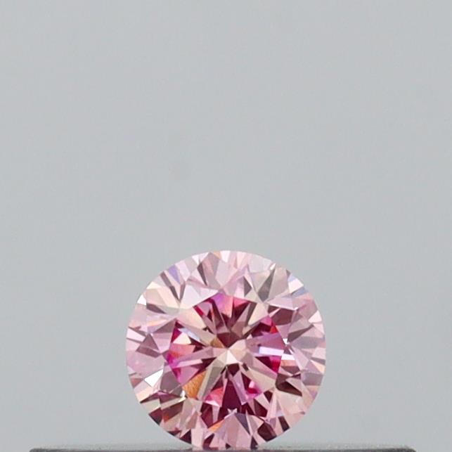 Actual 0.11 carat Intense Pink Round lab-grown diamond