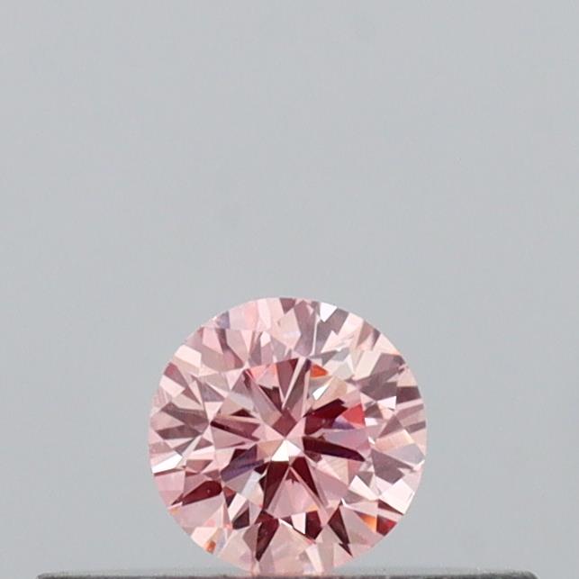 Actual 0.13 carat Intense Pink Round lab-grown diamond