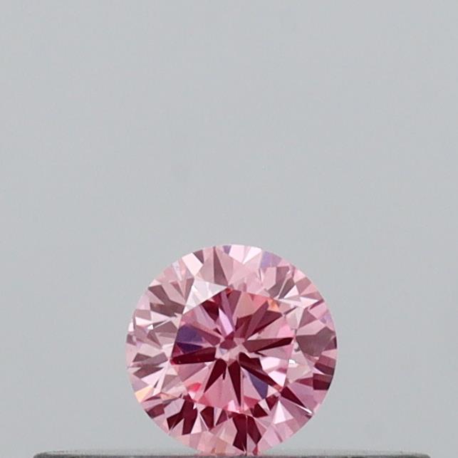 Actual 0.12 carat Intense Pink Round lab-grown diamond