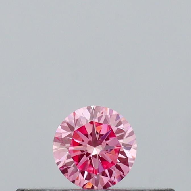 Actual 0.13 carat Vivid Pink Round lab-grown diamond