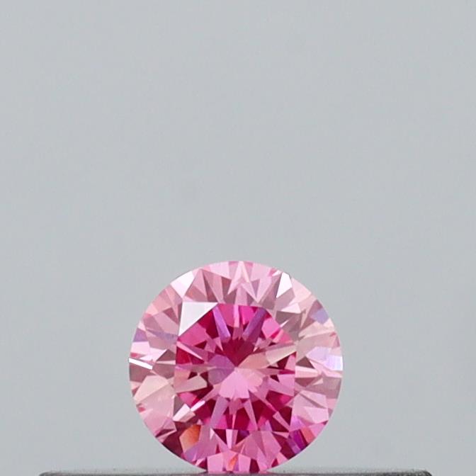 Actual 0.12 carat Vivid Pink Round lab-grown diamond