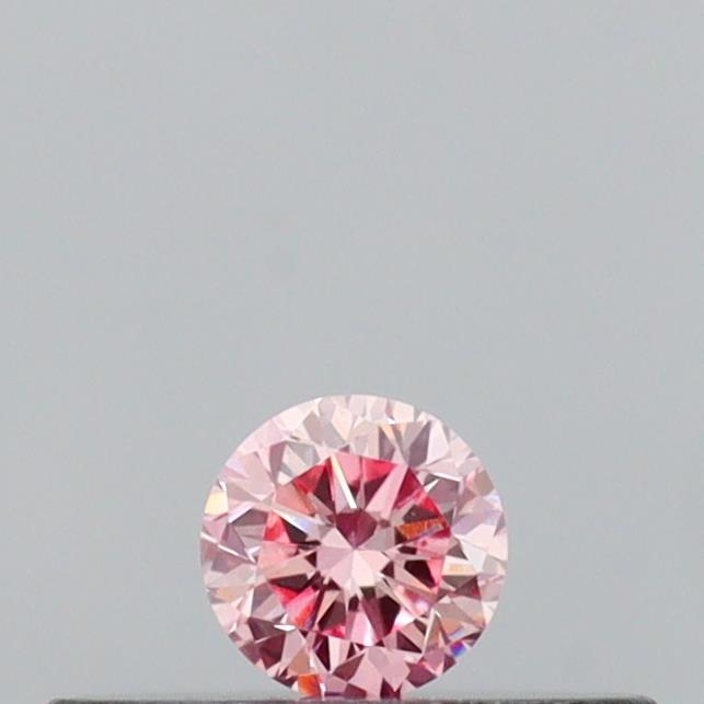 Actual 0.11 carat Intense Pink Round lab-grown diamond