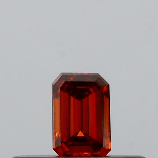 Actual 0.14 carat Vivid Orange Emerald lab-grown diamond
