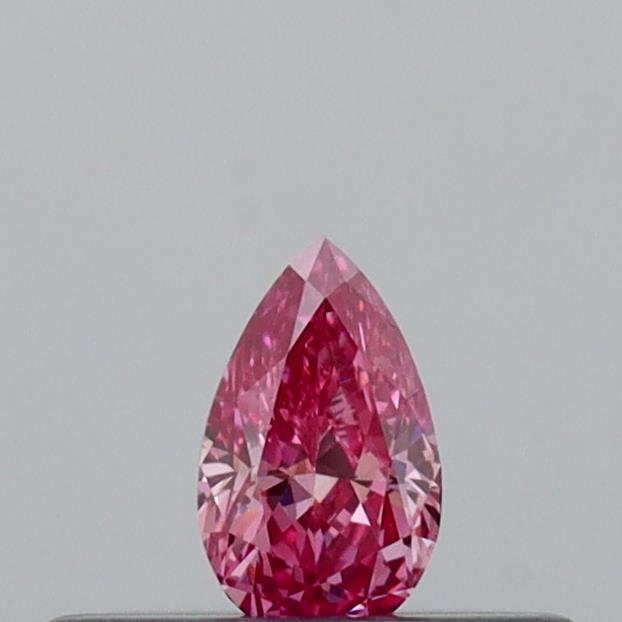 Actual 0.14 carat Vivid Pink Pear lab-grown diamond
