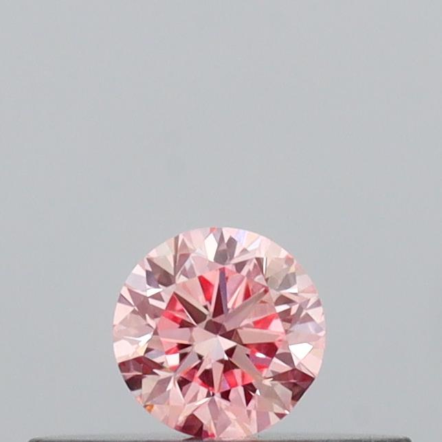 Actual 0.14 carat Intense Pink Round lab-grown diamond