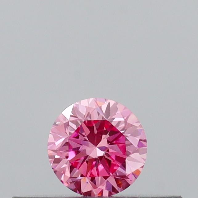 Actual 0.17 carat Vivid Pink Round lab-grown diamond