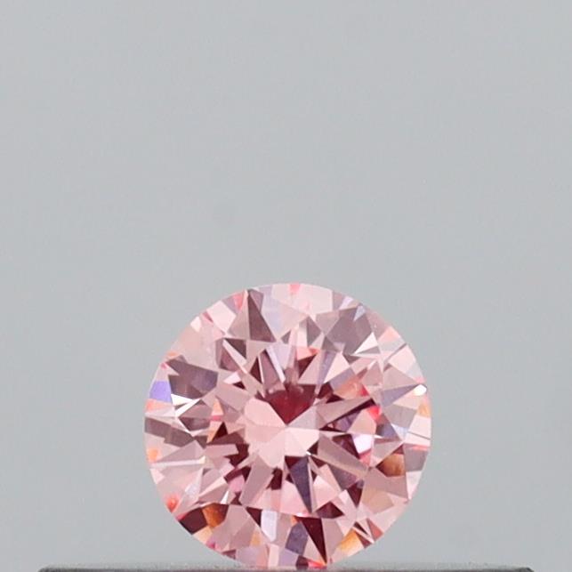 Actual 0.14 carat Intense Pink Round lab-grown diamond