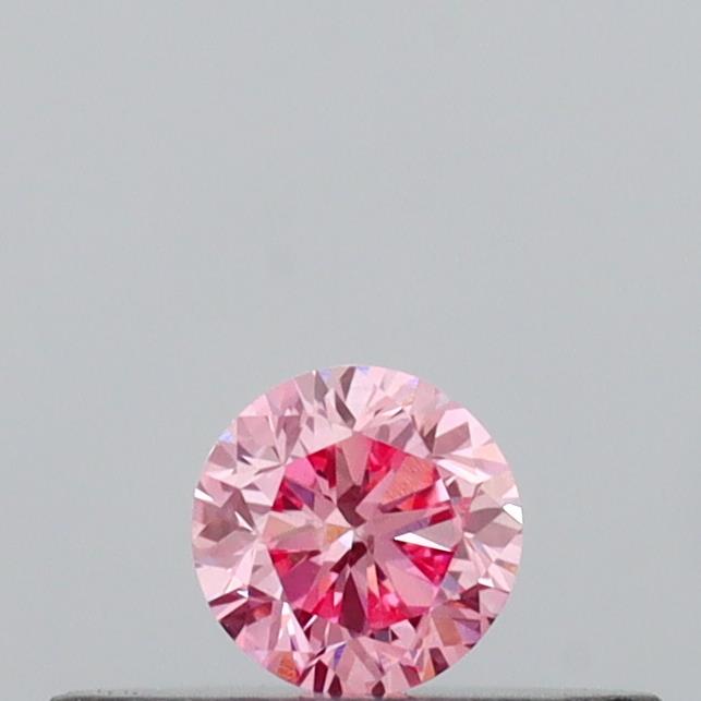 Actual 0.14 carat Vivid Pink Round lab-grown diamond