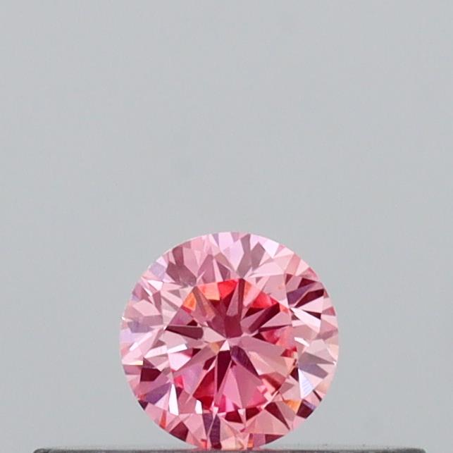 Actual 0.14 carat Intense Pink Round lab-grown diamond