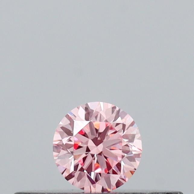 Actual 0.13 carat Intense Pink Round lab-grown diamond