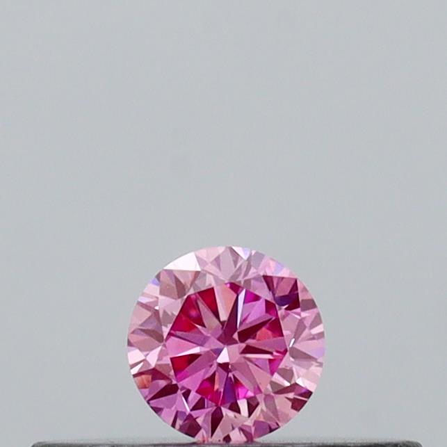 Actual 0.11 carat Vivid Pink Round lab-grown diamond