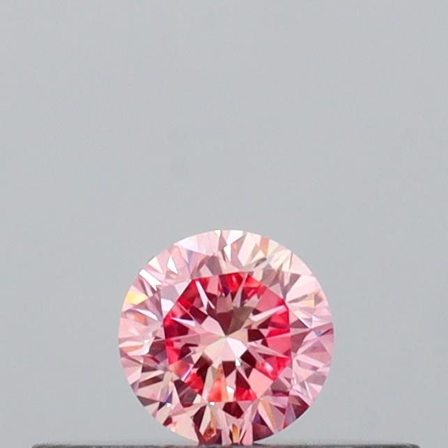 Actual 0.14 carat Intense Pink Round lab-grown diamond