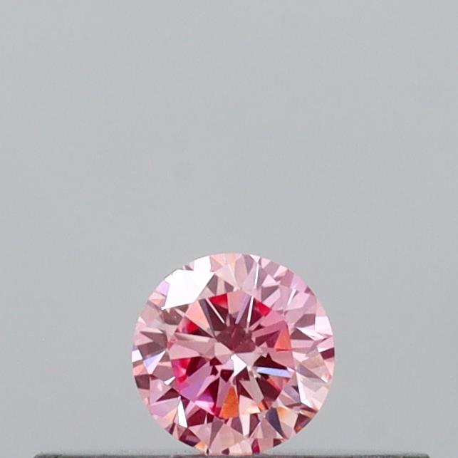 Actual 0.11 carat Intense Pink Round lab-grown diamond