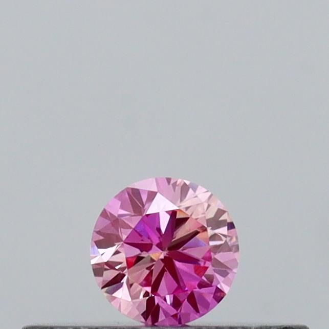 Actual 0.12 carat Vivid Pink Round lab-grown diamond