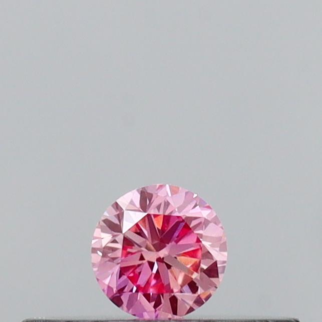 Actual 0.1 carat Vivid Pink Round lab-grown diamond