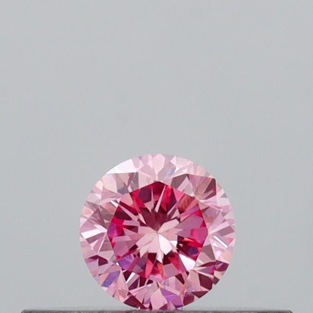 Actual 0.16 carat Vivid Pink Round lab-grown diamond