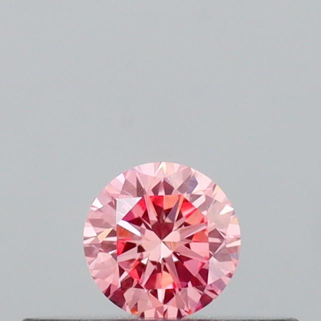 Actual 0.15 carat Vivid Pink Round lab-grown diamond