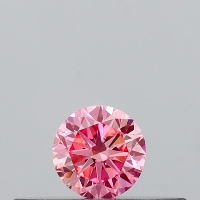 Actual 0.13 carat Vivid Pink Round lab-grown diamond