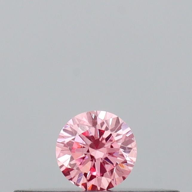 Actual 0.09 carat Vivid Pink Round lab-grown diamond