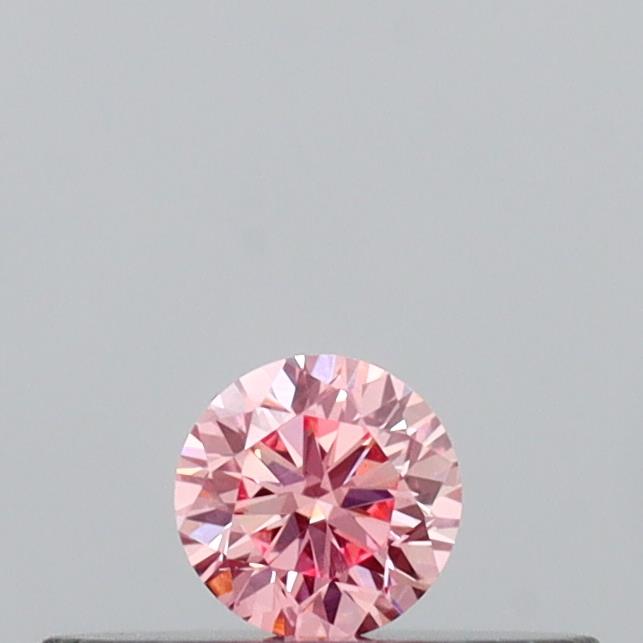 Actual 0.11 carat Intense Pink Round lab-grown diamond
