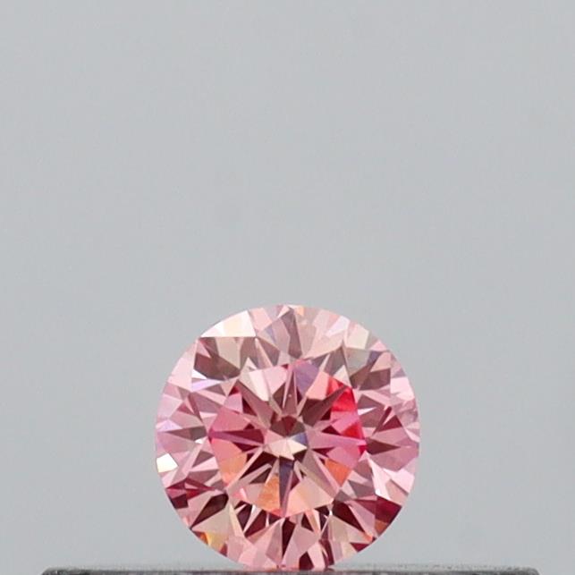 Actual 0.13 carat Intense Pink Round lab-grown diamond