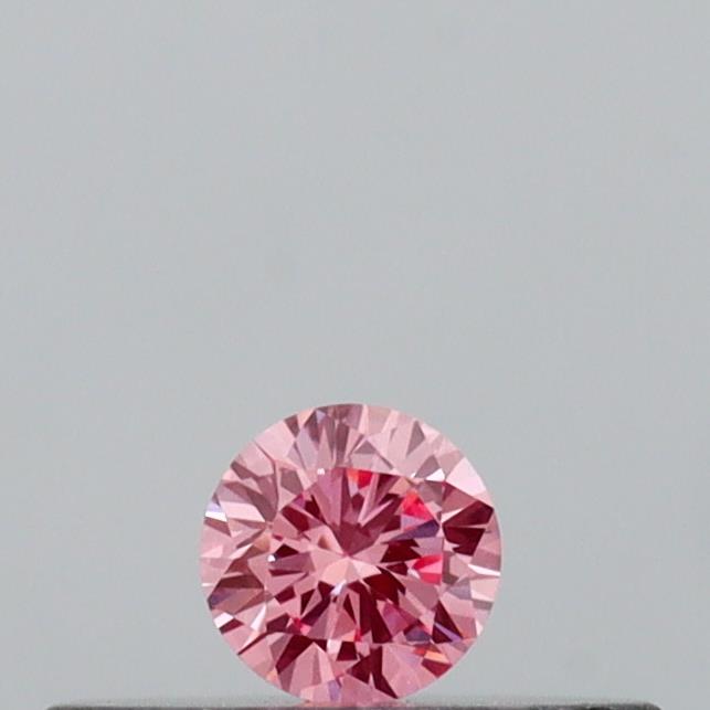 Actual 0.09 carat Vivid Pink Round lab-grown diamond