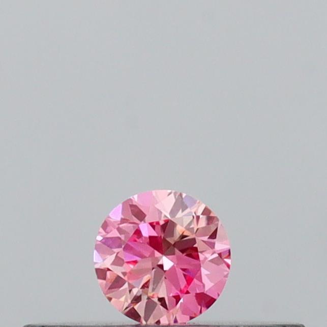 Actual 0.09 carat Vivid Pink Round lab-grown diamond