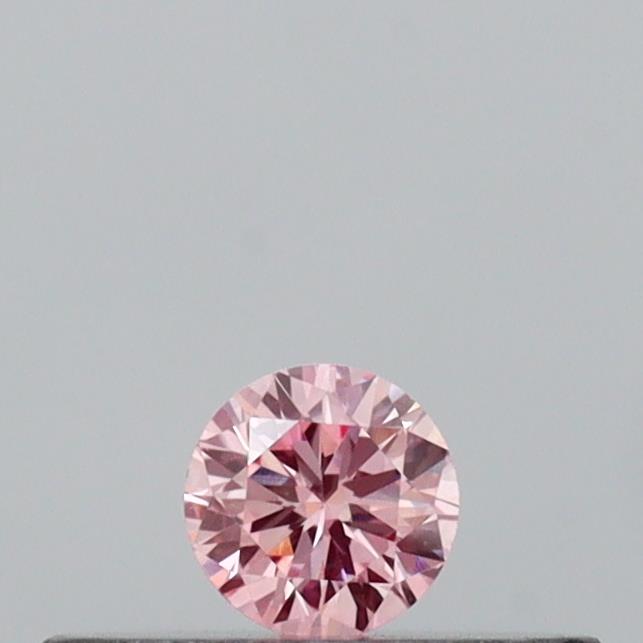 Actual 0.09 carat Intense Pink Round lab-grown diamond