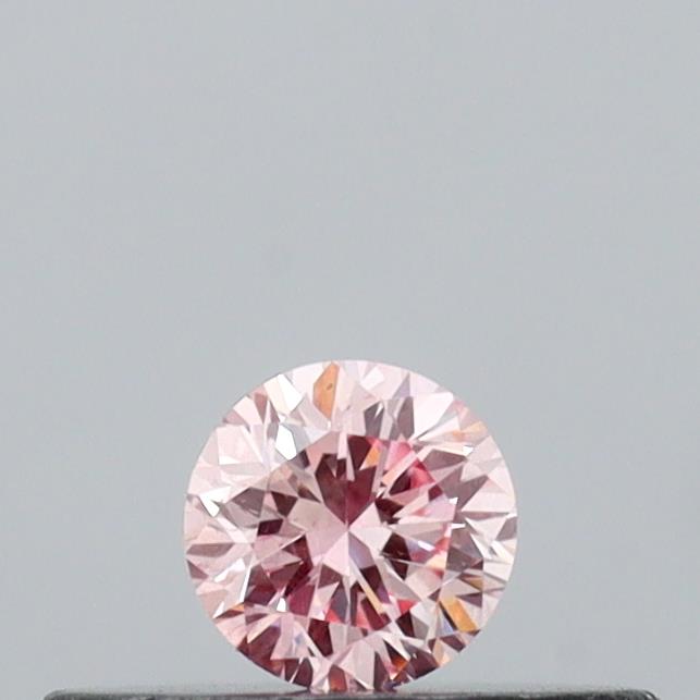 Actual 0.15 carat Intense Pink Round lab-grown diamond