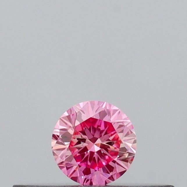 Actual 0.12 carat Vivid Pink Round lab-grown diamond