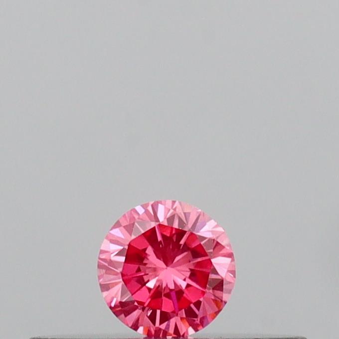 Actual 0.09 carat Vivid Pink Round lab-grown diamond