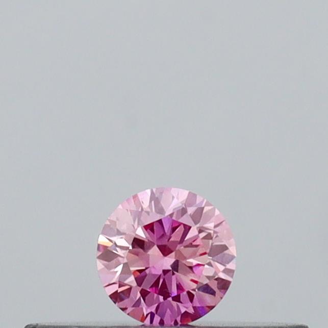 Actual 0.09 carat Intense Pink Round lab-grown diamond