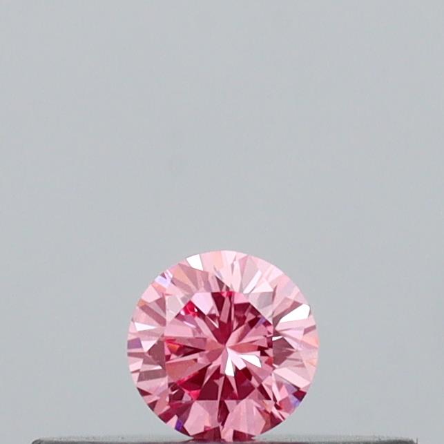 Actual 0.09 carat Vivid Pink Round lab-grown diamond