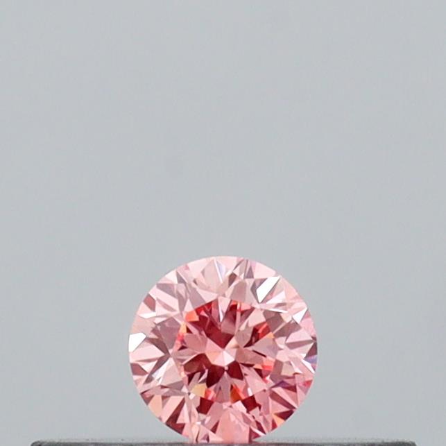 Actual 0.09 carat Intense Pink Round lab-grown diamond