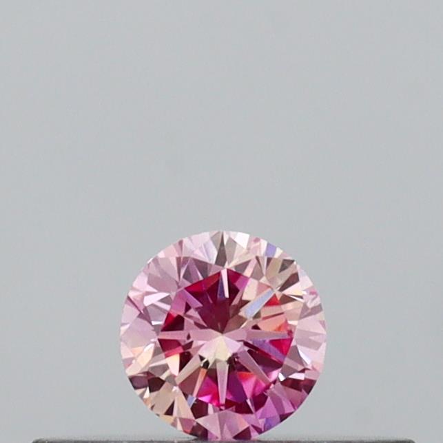 Actual 0.13 carat Vivid Pink Round lab-grown diamond