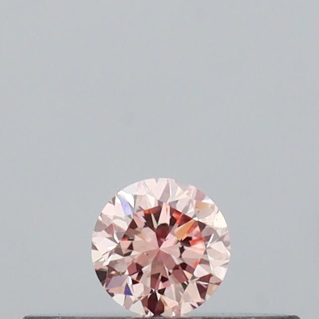 Actual 0.11 carat Intense Pink Round lab-grown diamond
