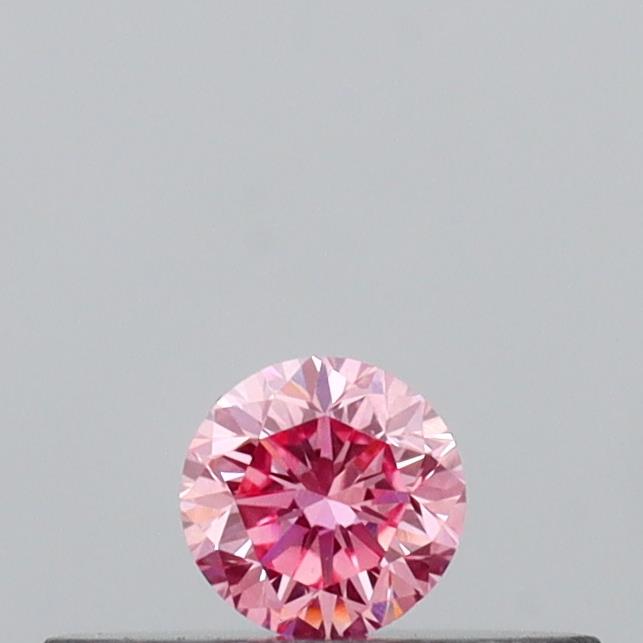 Actual 0.12 carat Vivid Pink Round lab-grown diamond