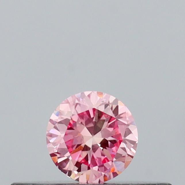 Actual 0.16 carat Vivid Pink Round lab-grown diamond