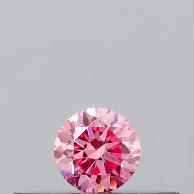 Actual 0.11 carat Vivid Pink Round lab-grown diamond