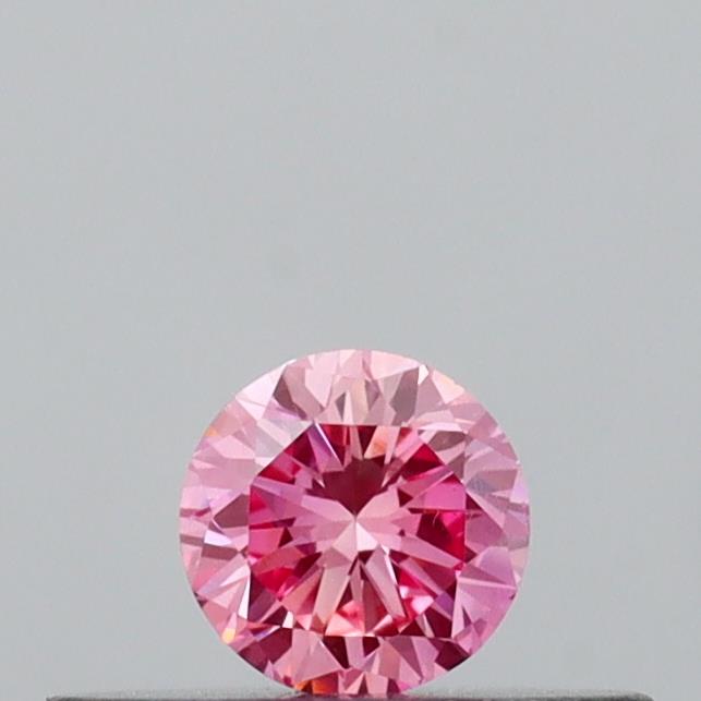 Actual 0.16 carat Vivid Pink Round lab-grown diamond