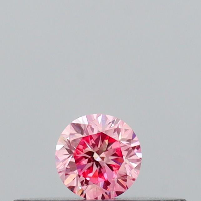Actual 0.11 carat Vivid Pink Round lab-grown diamond