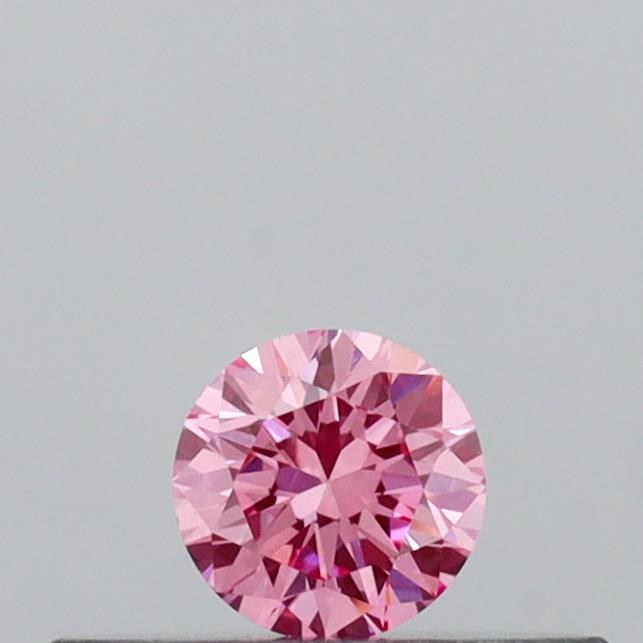 Actual 0.14 carat Vivid Pink Round lab-grown diamond