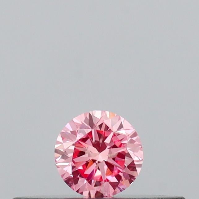 Actual 0.11 carat Vivid Pink Round lab-grown diamond