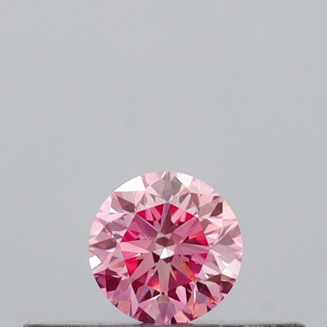 Actual 0.14 carat Vivid Pink Round lab-grown diamond