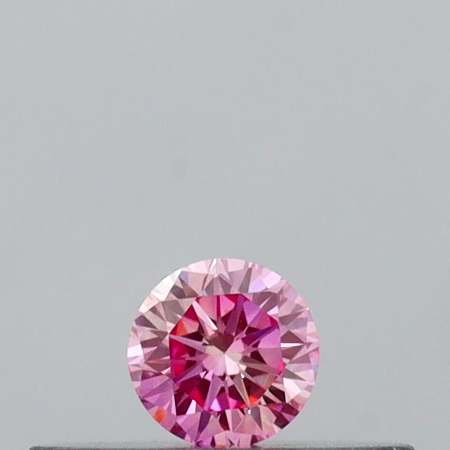Actual 0.09 carat Vivid Pink Round lab-grown diamond