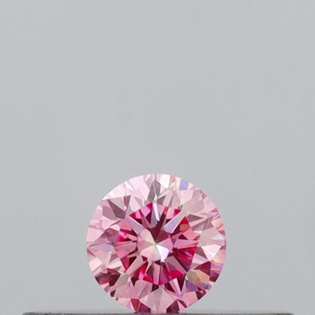 Actual 0.11 carat Vivid Pink Round lab-grown diamond