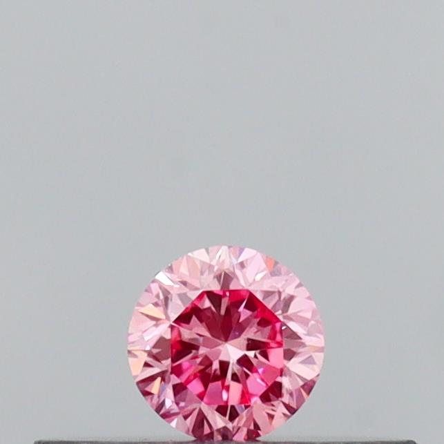 Actual 0.12 carat Vivid Pink Round lab-grown diamond