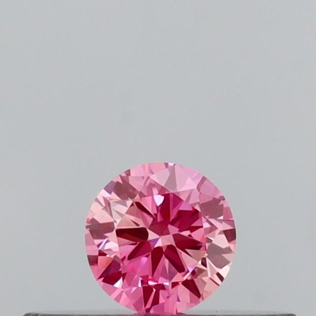 Actual 0.13 carat Vivid Pink Round lab-grown diamond